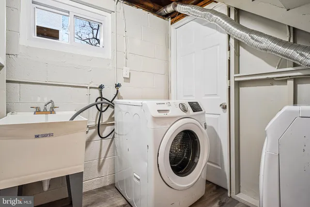 a utility room with dryer and washer