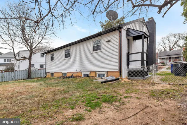 a view of a backyard of the house