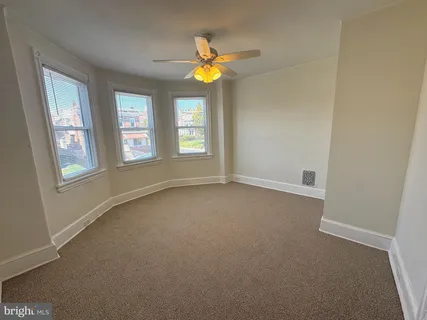 an empty room that has a window