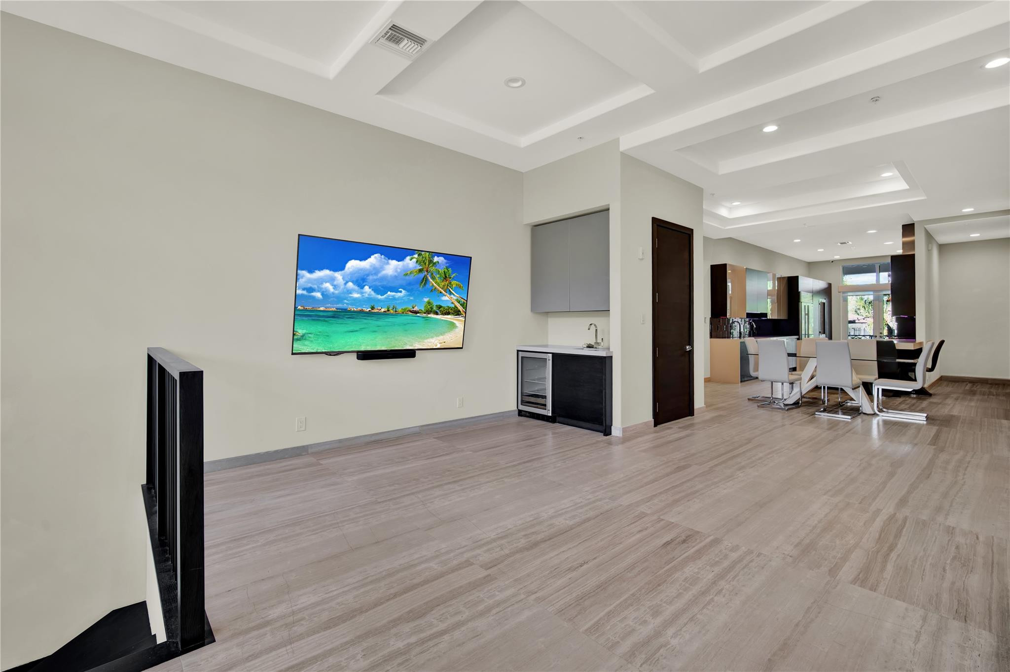 425 North Ocean Boulevard, Unit 3 Boca Raton, FL 33432 - Photo 20 of 69 a view of a livingroom with furniture and a flat screen tv