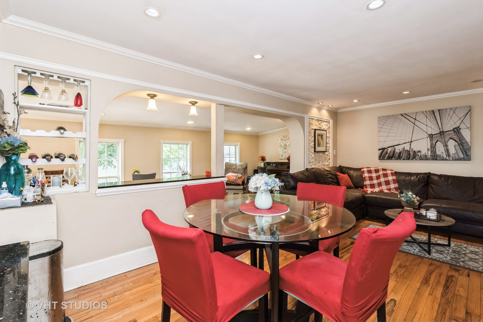 5037 Fargo Avenue Skokie, IL 60077 - Photo 10 of 20 a view of a dining room with furniture and a potted plant