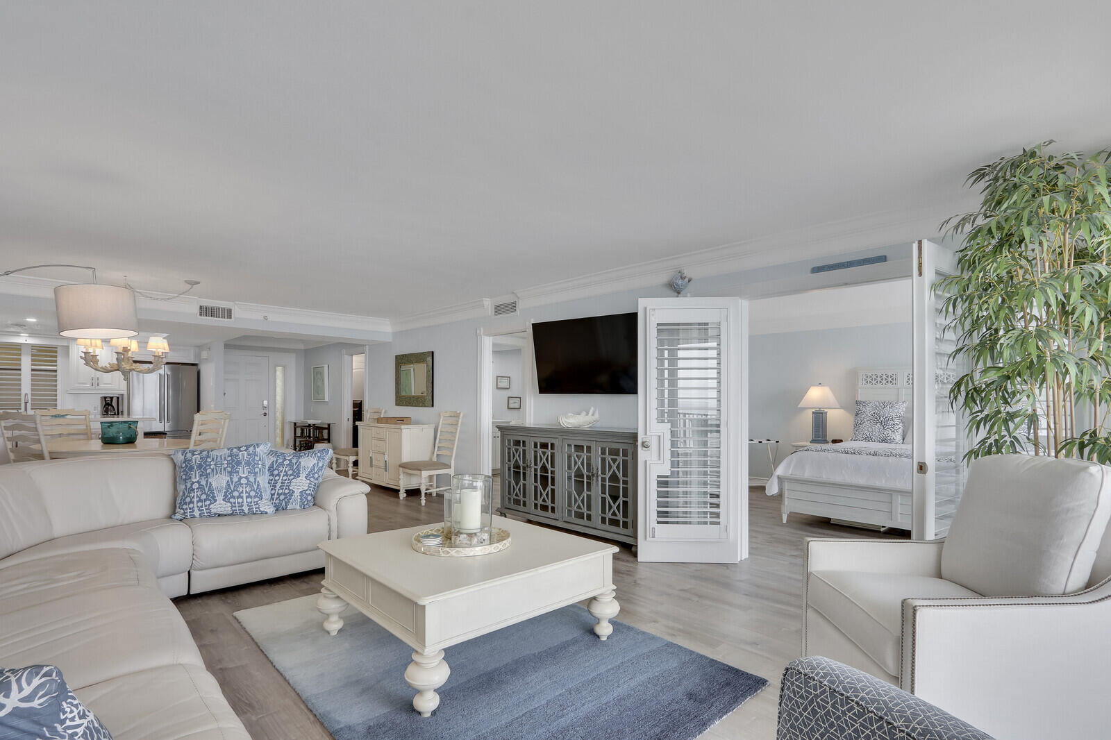 200 South Beach Road, Unit 802 Tequesta, FL 33469 - Photo 20 of 48 a living room with furniture and a flat screen tv