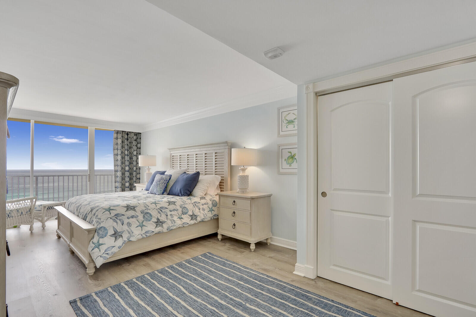 200 South Beach Road, Unit 802 Tequesta, FL 33469 - Photo 27 of 48 a bedroom with a bed and a table