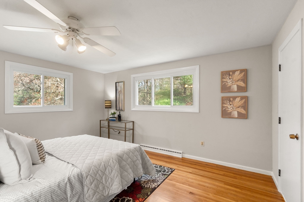 30 Hampton Road Sharon, MA 02067 - Photo 19 of 29 a bedroom with a large bed and a window
