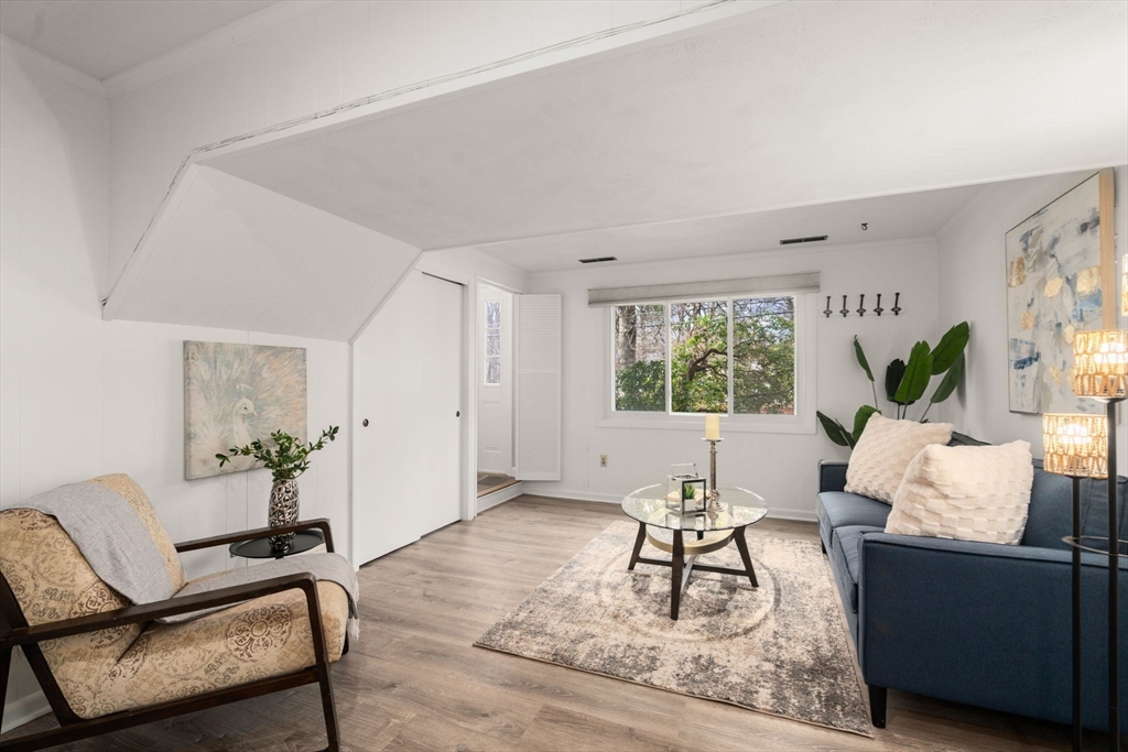 30 Hampton Road Sharon, MA 02067 - Photo 25 of 29 a living room with furniture and a window