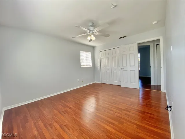 a view of a big yard with an outdoor space