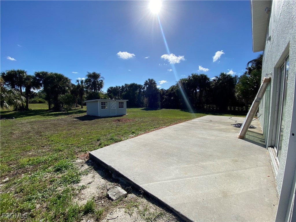260 13th Street Southwest Naples, FL 34117 - Photo 29 of 29 a view of a backyard