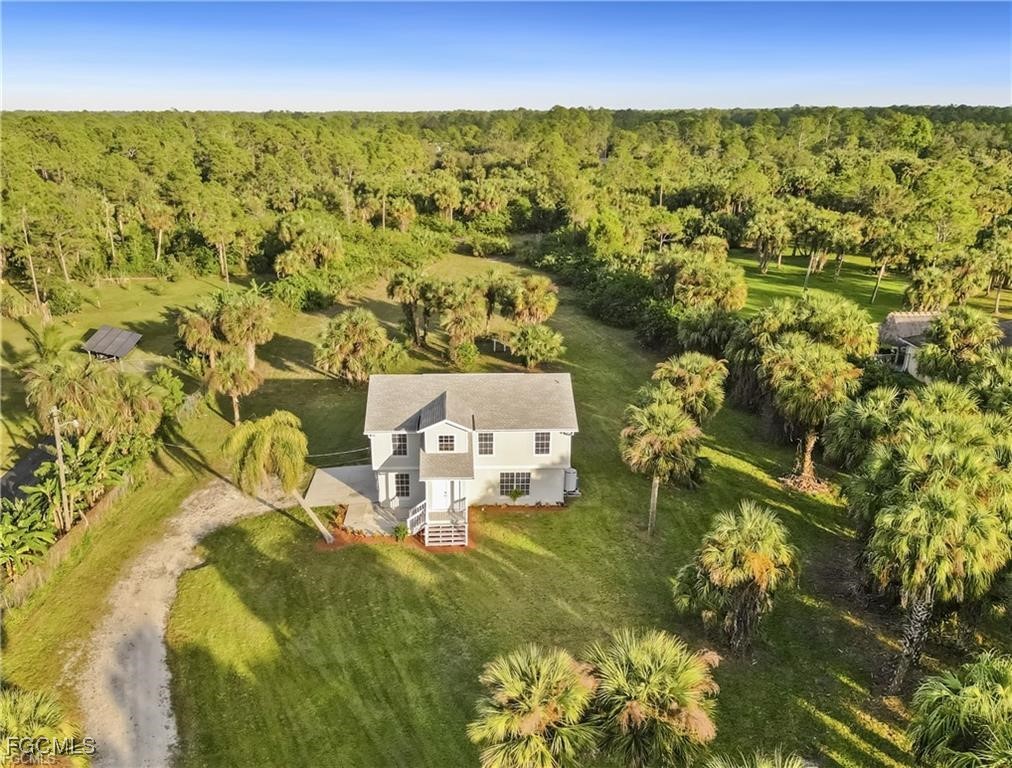 260 13th Street Southwest Naples, FL 34117 - Photo 3 of 29 view of city and mountain