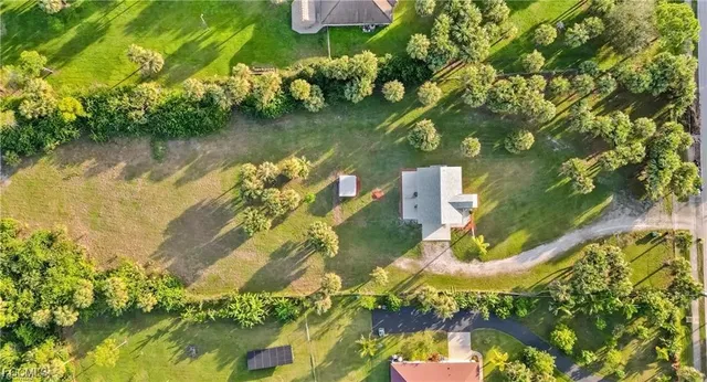 a view of a lake with a yard