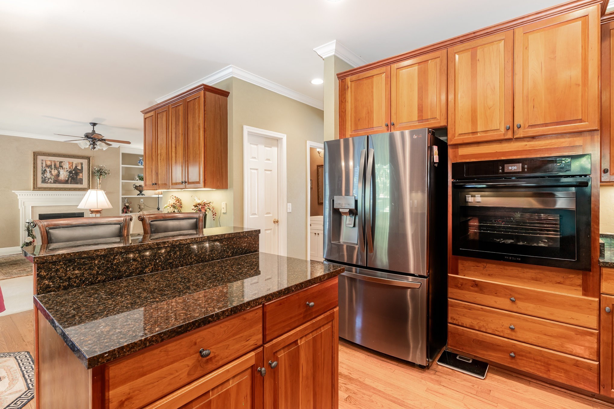 224 Logans Circle Franklin, TN 37067 - Photo 13 of 41 a kitchen with stainless steel appliances granite countertop a refrigerator and a stove top oven