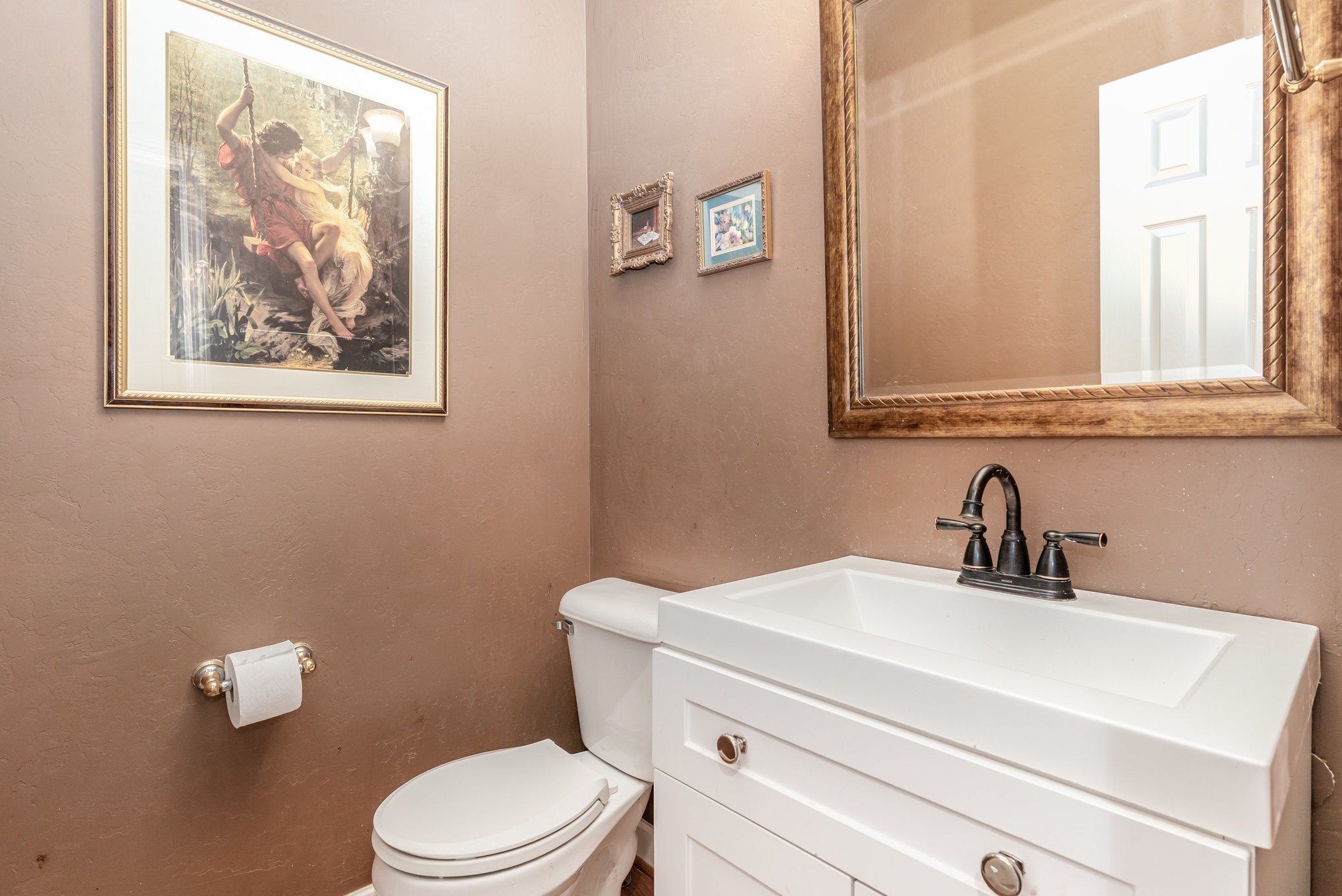 224 Logans Circle Franklin, TN 37067 - Photo 15 of 41 a bathroom with a toilet a sink and mirror