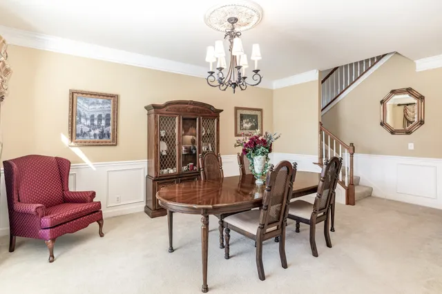 a bedroom with a bed and dresser
