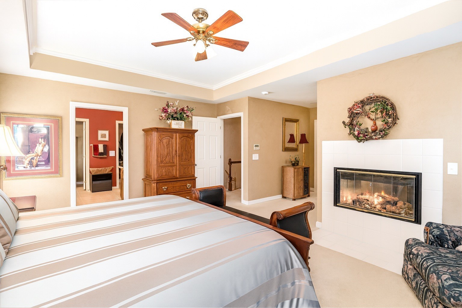 224 Logans Circle Franklin, TN 37067 - Photo 19 of 41 a bedroom with a bed and a fireplace