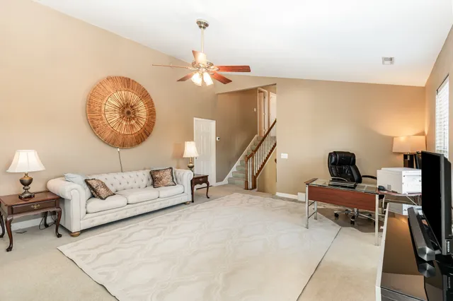 a bed room with a bed and a window