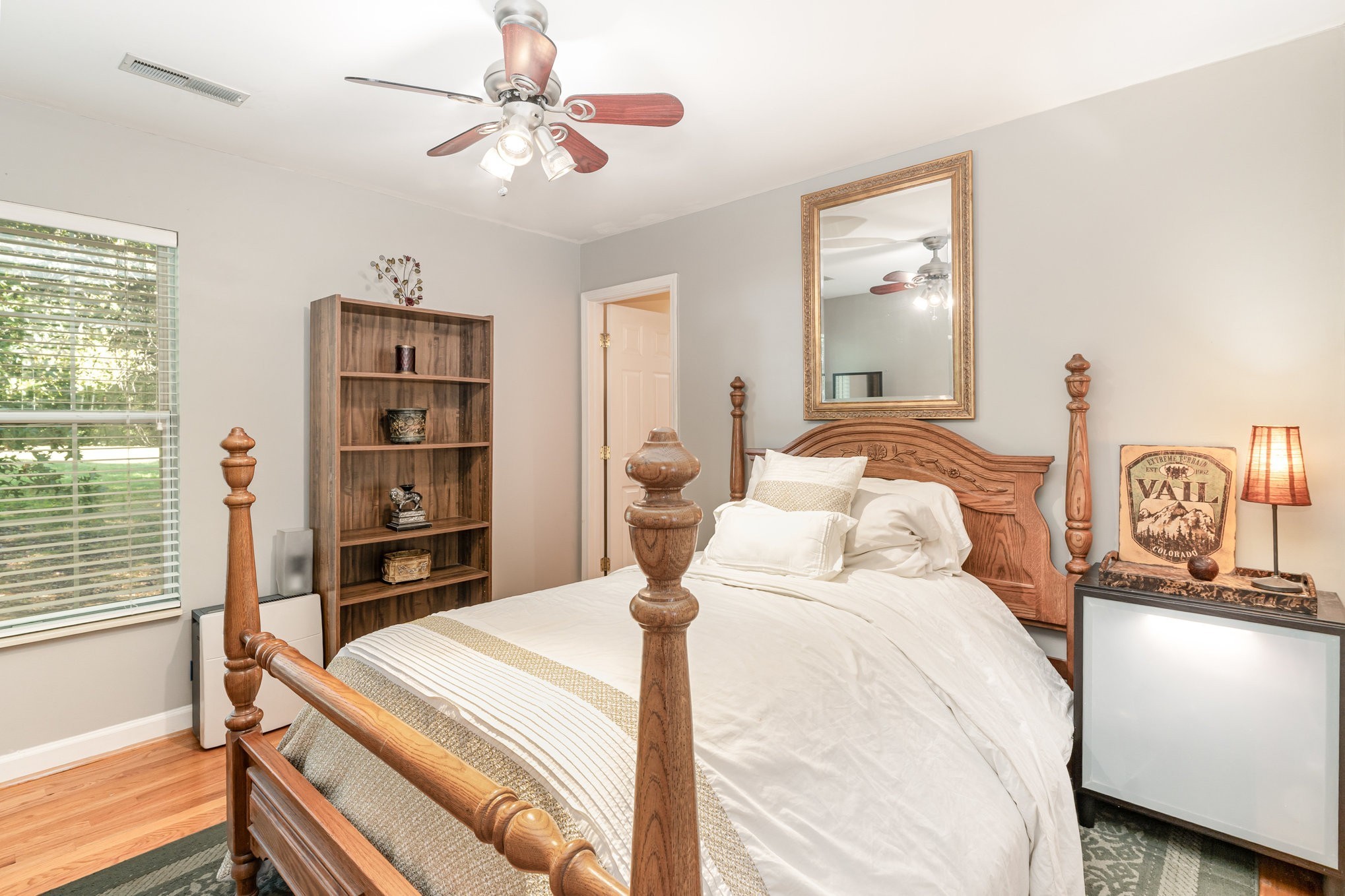 224 Logans Circle Franklin, TN 37067 - Photo 29 of 41 a bedroom with a bed and a chandelier