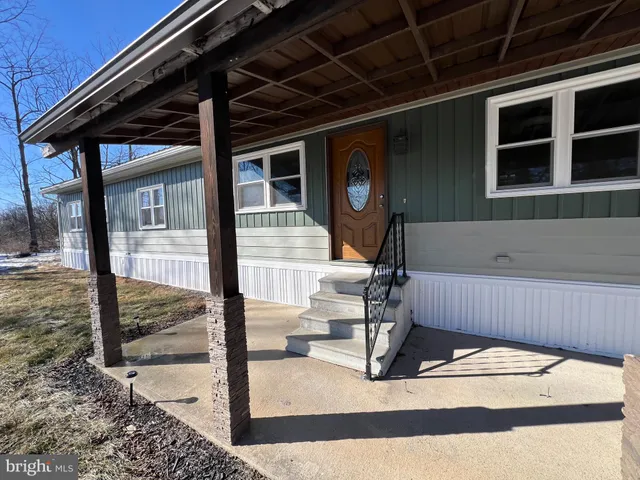a view of a backyard of a house