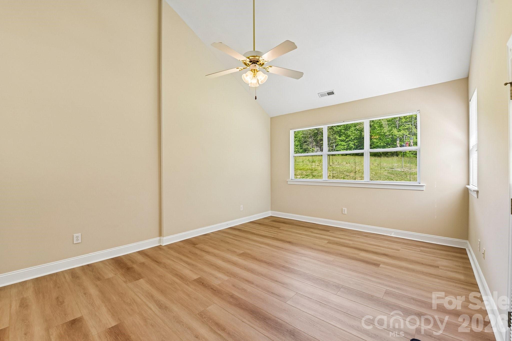 3854 Azalea Trail Denver, NC 28037 - Photo 14 of 22 a view of an empty room with a window