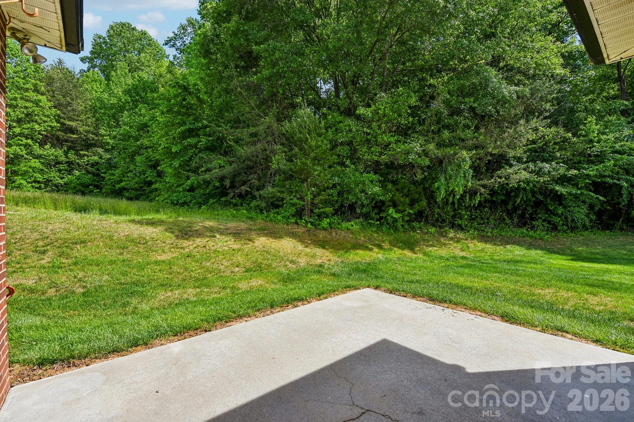 3854 Azalea Trail Denver, NC 28037 - Photo 20 of 22 a view of a street with a small yard