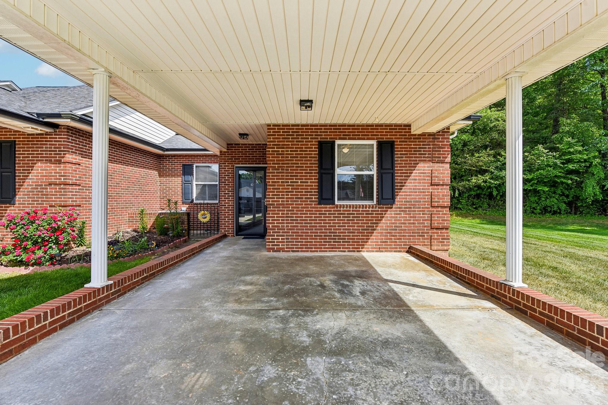 3854 Azalea Trail Denver, NC 28037 - Photo 2 of 22 a view of a house with backyard and porch