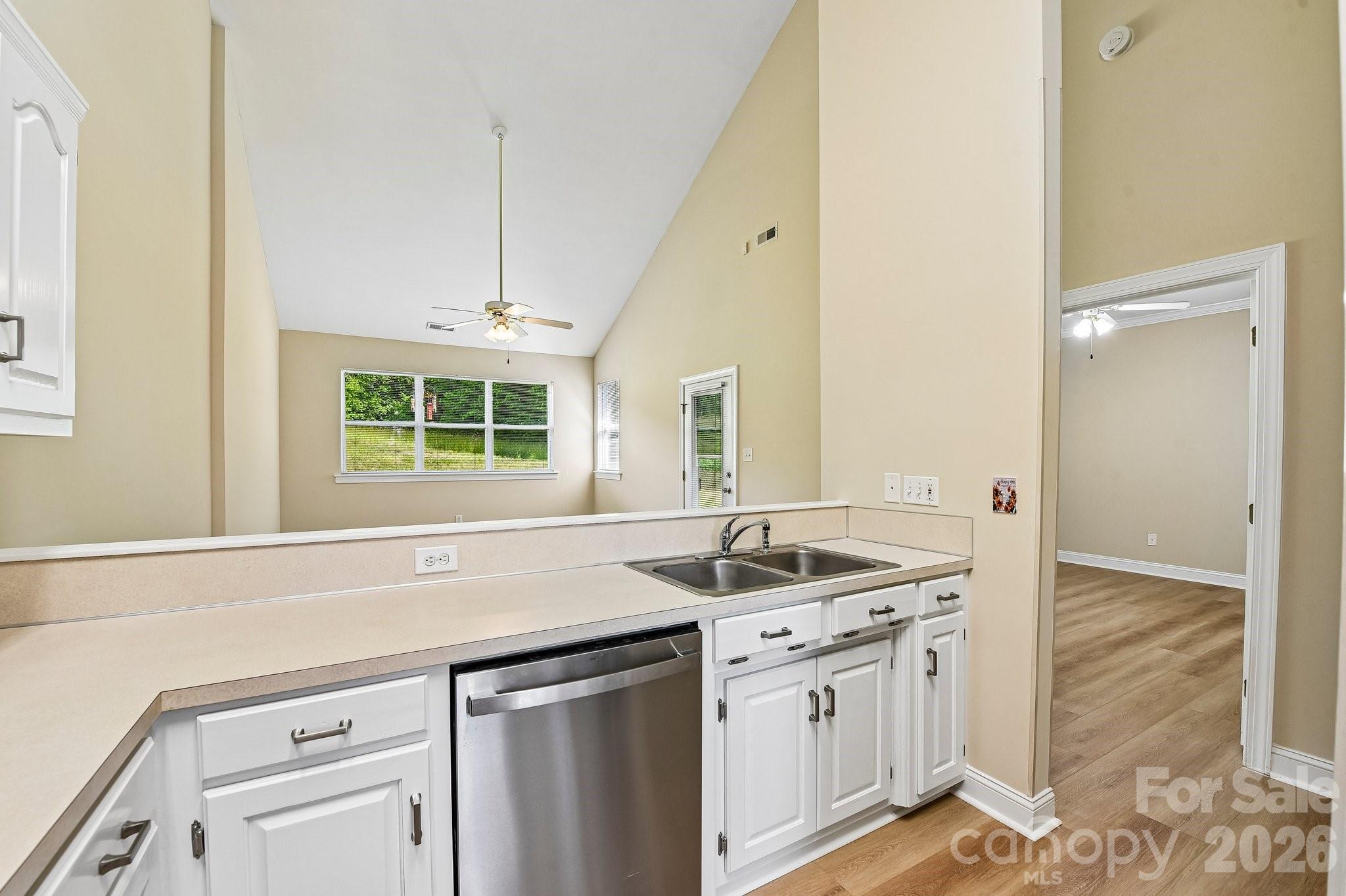 3854 Azalea Trail Denver, NC 28037 - Photo 9 of 22 a kitchen with stainless steel appliances granite countertop a sink and a window