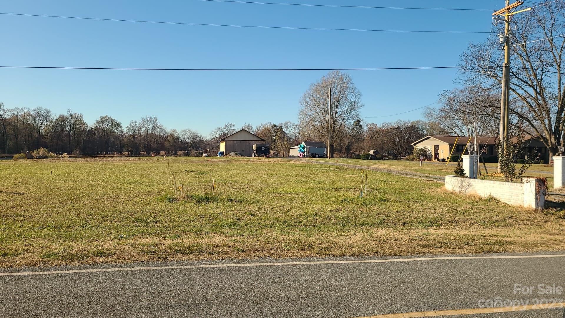 6701 Sugar And Wine Road Monroe, NC 28110 - Photo 2 of 6 a view of a yard with a house