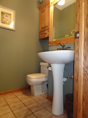 511 San Carlos Road Minooka, IL 60447 - Photo 22 of 22 a bathroom with a toilet and a mirror