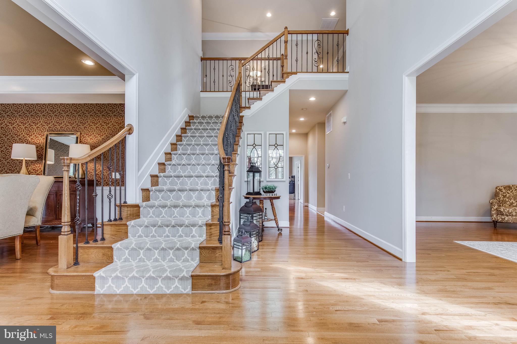 41848 Rawnsley Drive Ashburn, VA 20148 - Photo 2 of 30 Elegent 2 Story Foyer with Wrought Iron Spindles
