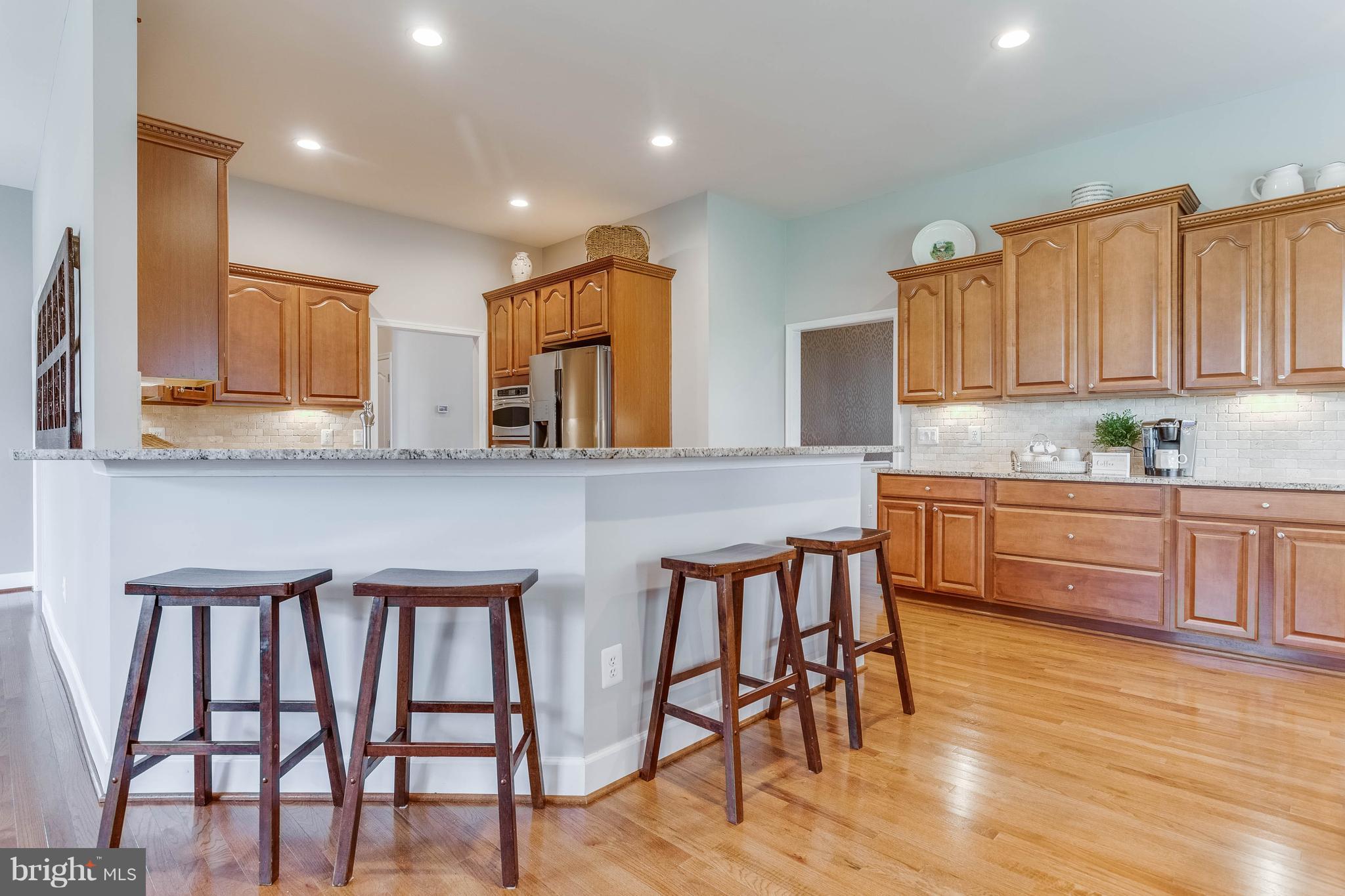 41848 Rawnsley Drive Ashburn, VA 20148 - Photo 7 of 30 Gourmet Kitchen with Breakfast Bar