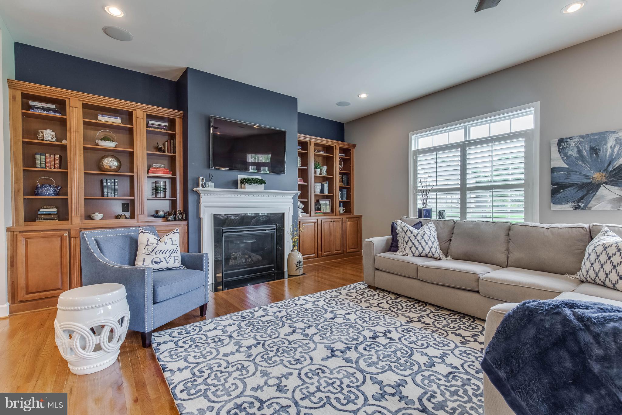 41848 Rawnsley Drive Ashburn, VA 20148 - Photo 9 of 30 Amazing Family Room with Built-in Shelving