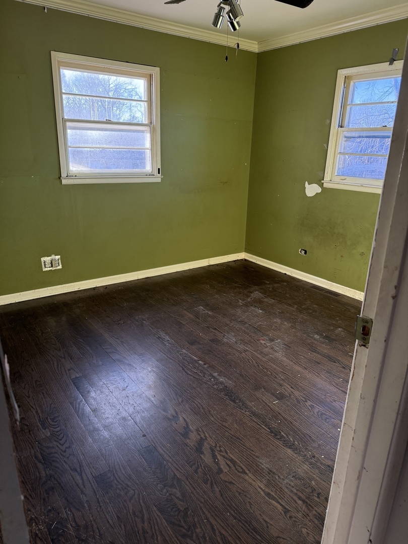 35049 North Edgewater Lane Ingleside, IL 60041 - Photo 4 of 9 a view of a room with wooden floor and entryway