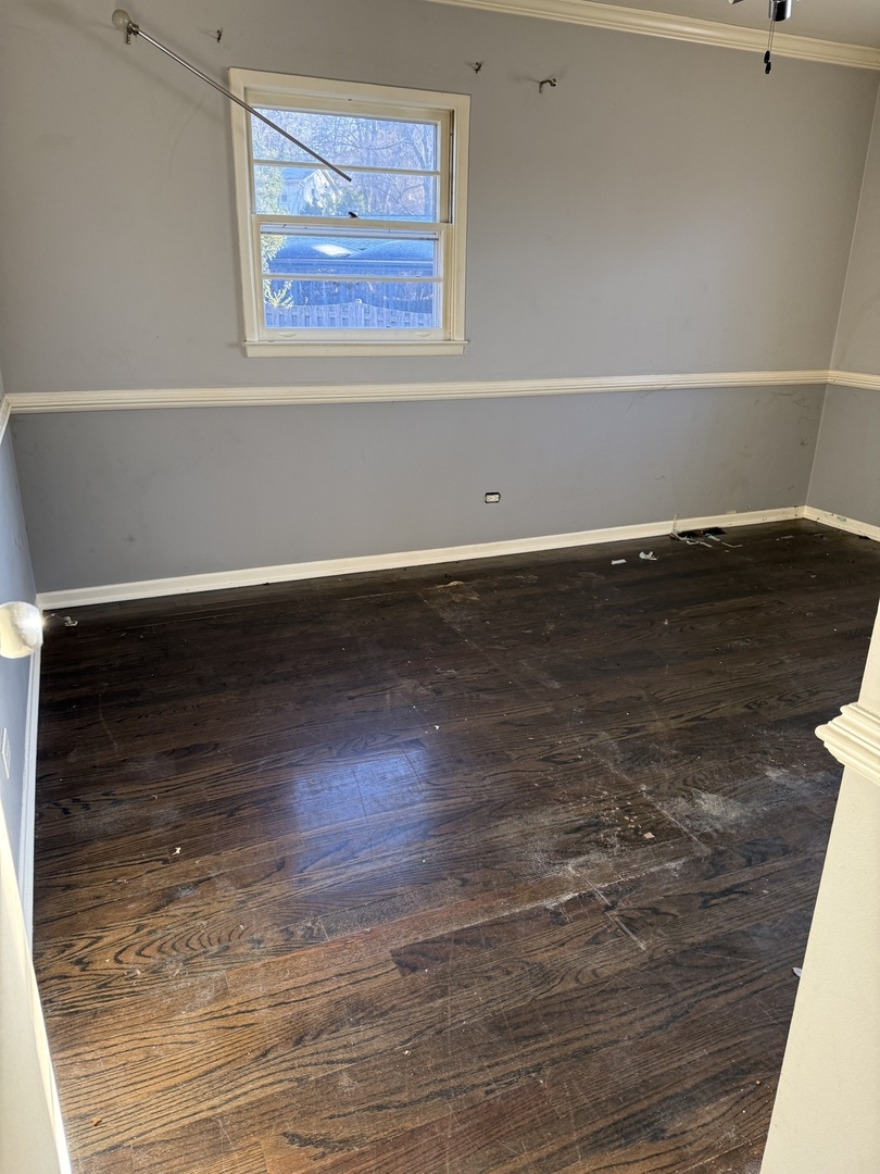 35049 North Edgewater Lane Ingleside, IL 60041 - Photo 5 of 9 a view of a room with wooden floor and cabinet