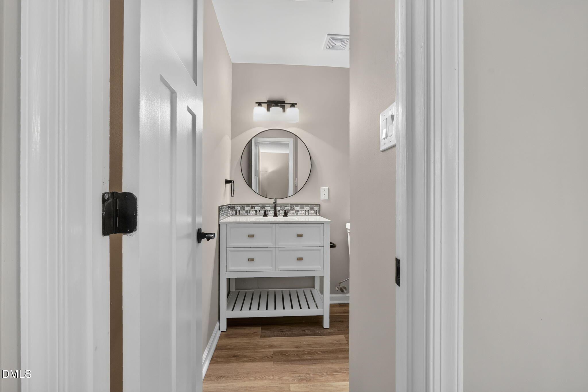 3425 Mill Run Raleigh, NC 27612 - Photo 28 of 40 a close view of a utility room with dryer and washer