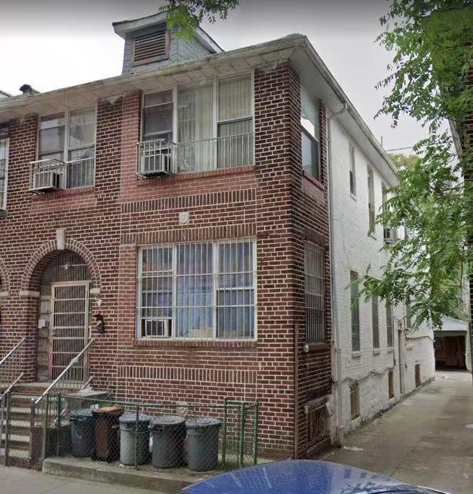 911 48th Street Brooklyn, NY 11219 - Photo 1 of 1 a front view of a house