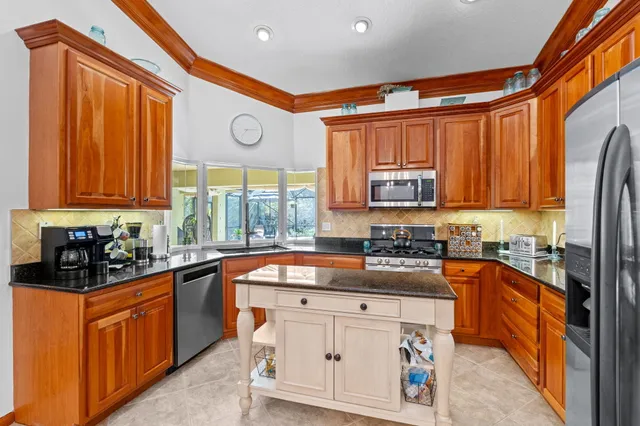 a view of a swimming pool with a patio