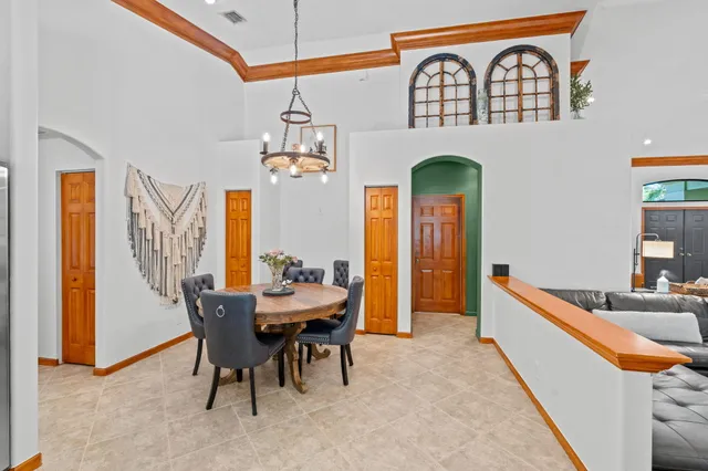 a view of a swimming pool with a lounge chairs