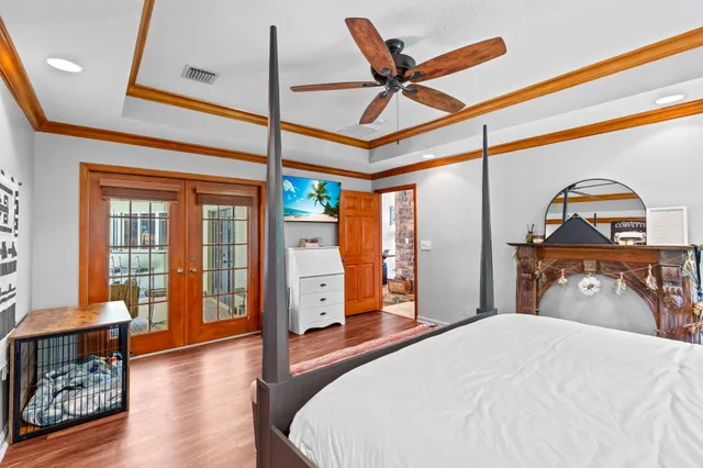 a view of a swimming pool with a yard