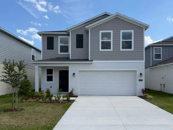 a front view of house with yard