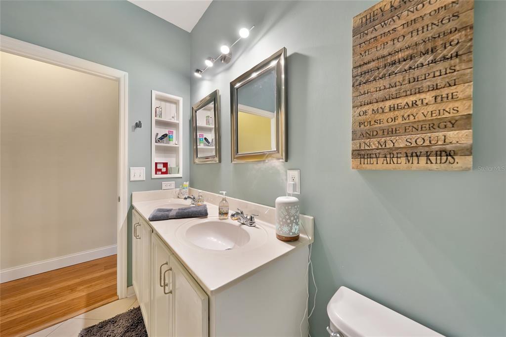 10007 Winding River Road Punta Gorda, FL 33950 - Photo 23 of 44 a bathroom with a sink and a mirror