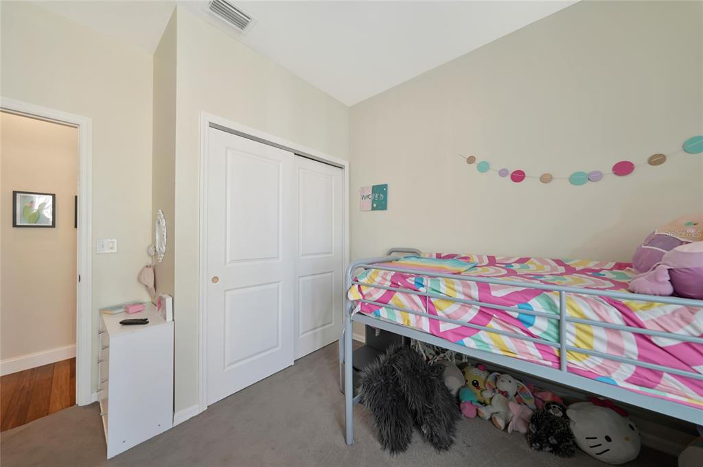 10007 Winding River Road Punta Gorda, FL 33950 - Photo 29 of 44 a kids room with toys and dresser