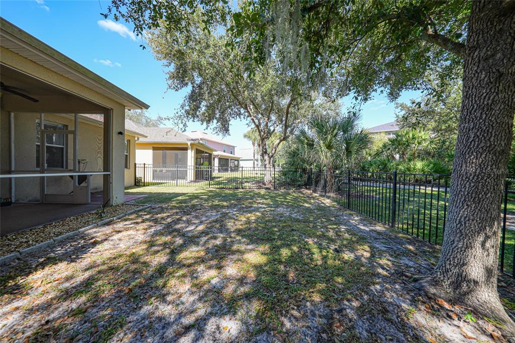 10007 Winding River Road Punta Gorda, FL 33950 - Photo 30 of 44 a view of house with backyard and garden