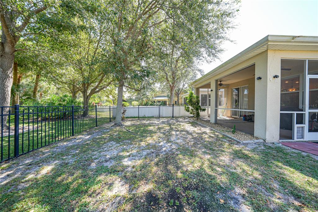 10007 Winding River Road Punta Gorda, FL 33950 - Photo 36 of 44 a view of backyard with green space