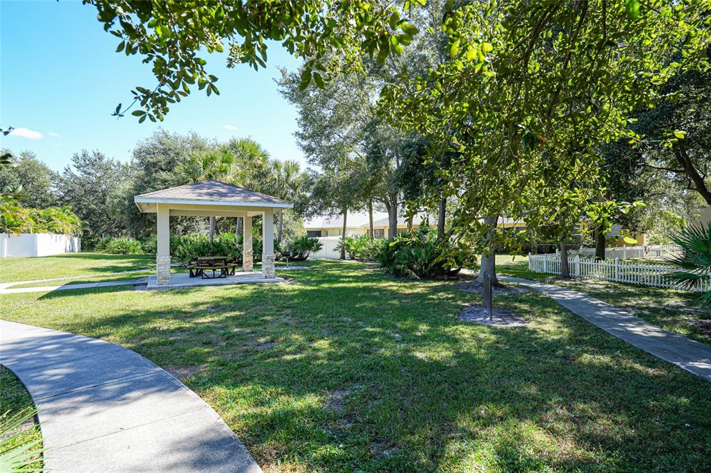 10007 Winding River Road Punta Gorda, FL 33950 - Photo 38 of 44 a view of a house with a yard