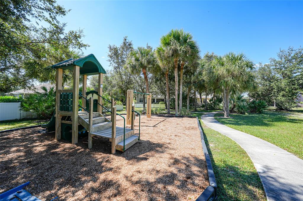 10007 Winding River Road Punta Gorda, FL 33950 - Photo 40 of 44 a view of a park with swings