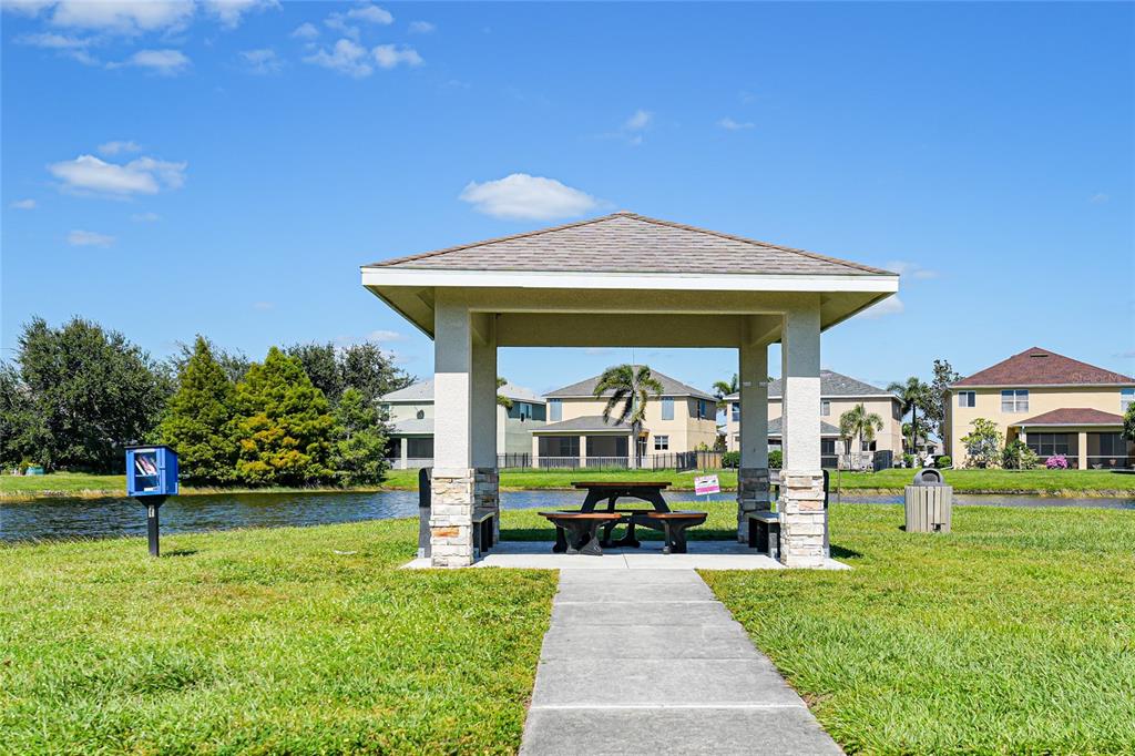 10007 Winding River Road Punta Gorda, FL 33950 - Photo 42 of 44 a view of a house with a yard