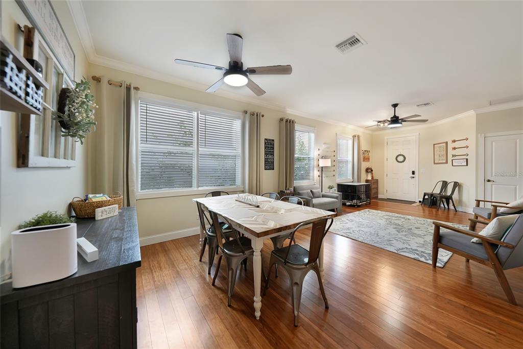 10007 Winding River Road Punta Gorda, FL 33950 - Photo 6 of 44 a view of a dining room with furniture window and wooden floor