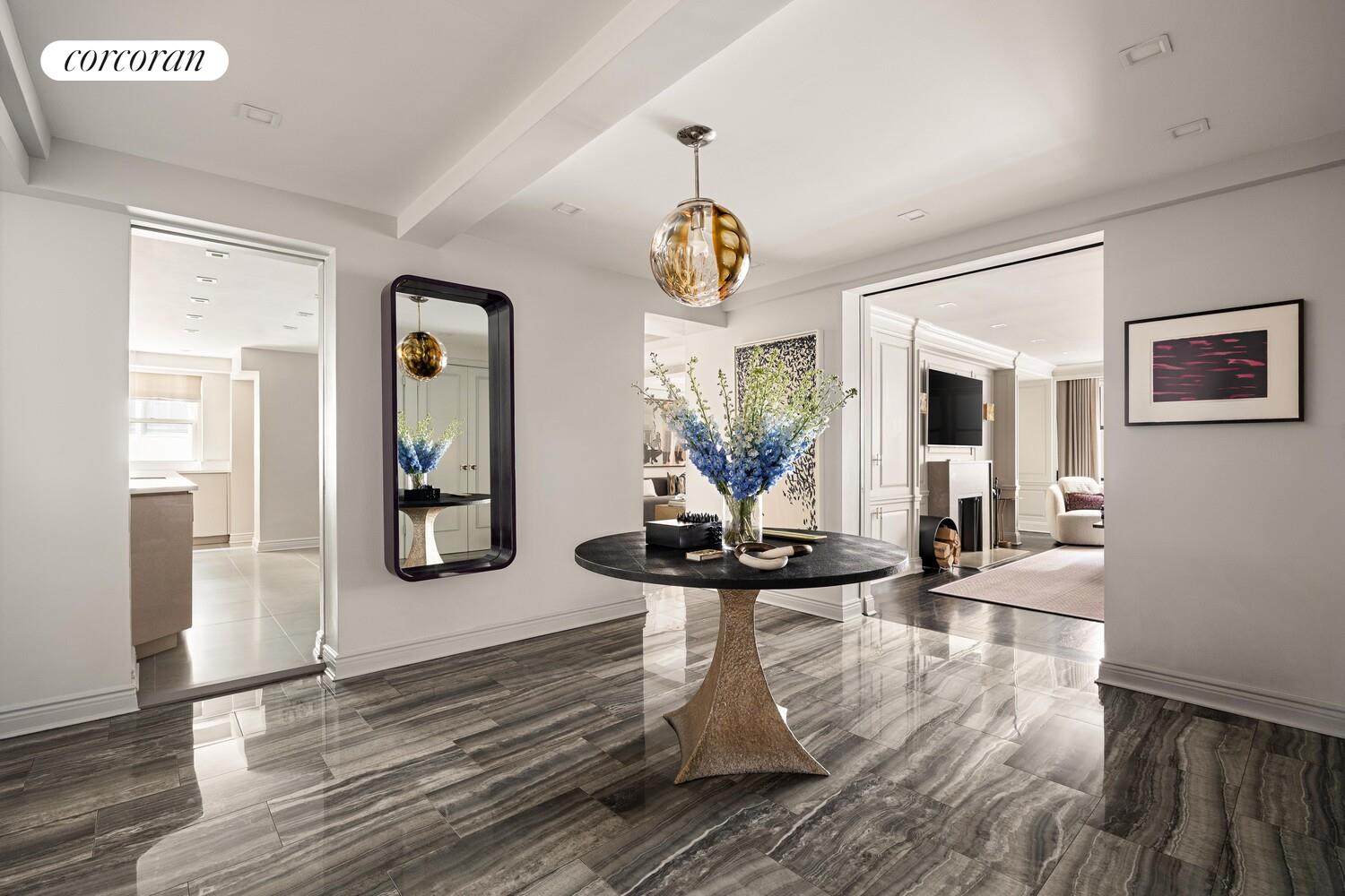 220 East 73rd Street, Unit 6D Manhattan, NY 10021 - Photo 3 of 19 a view of a living room and hardwood floor