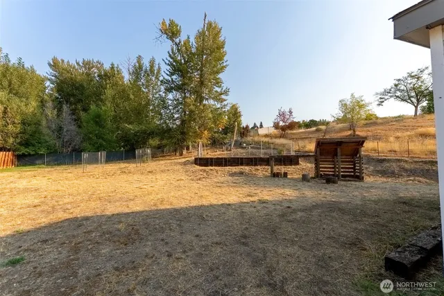 a view of a lake with a house