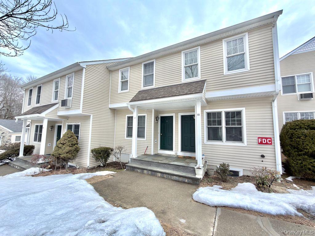a house view with a outdoor space