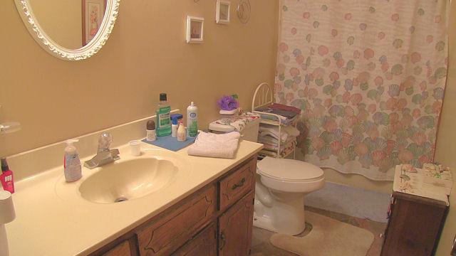 5160 Old Rome Pike Lebanon, TN 37087 - Photo 8 of 12 The bathroom has a single vanity and a shower tub combo.