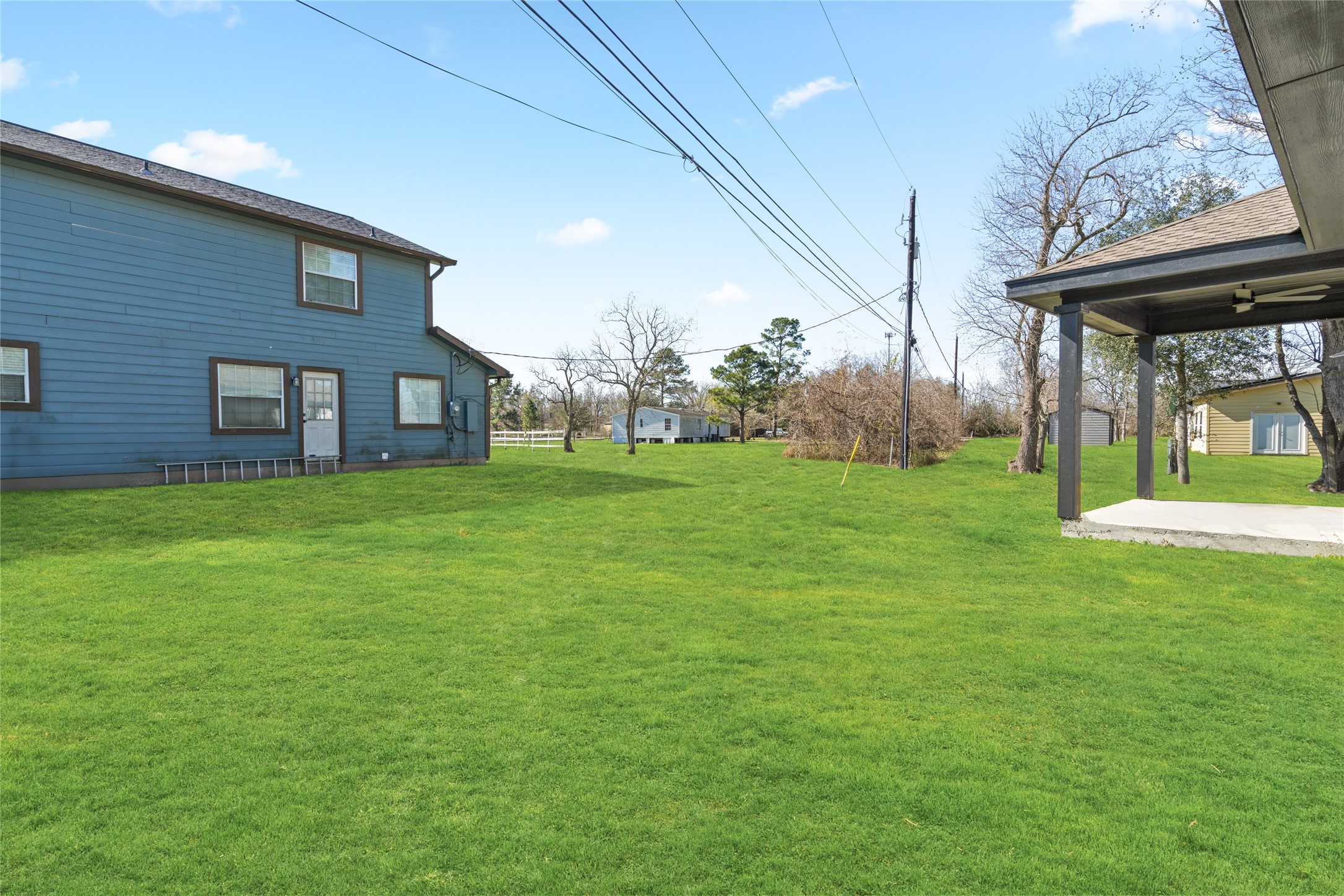 4654 North Teague Street Rosharon, TX 77583 - Photo 44 of 46 Open backyard with plenty of room for gardening, play, or entertaining. Fenced-in area offers privacy and security.